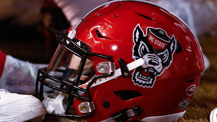 Nov 18, 2017; Winston-Salem, NC, USA; A North Carolina State Wolfpack helmet lays on the sidelines during the game against the Wake Forest Demon Deacons at BB&T Field. Mandatory Credit: Jeremy Brevard-Imagn Images