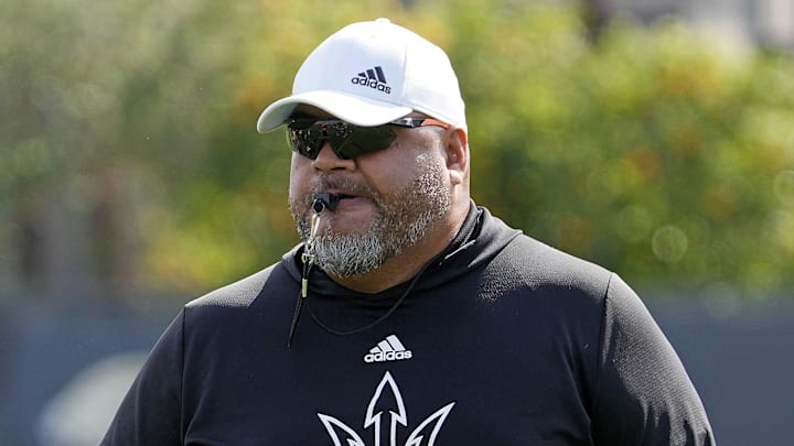 Arizona State Sun Devils OL coach Saga Tuitele instructs his players during spring football practice at the Kajikawa practice fields in Tempe on March 16, 2023.

Ncaa Football Asu Spring Football Practice
