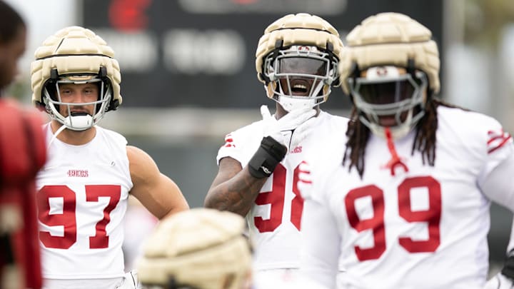 Jul 24, 2025; Santa Clara, CA, USA; San Francisco 49ers defensive ends Nick Bosa (97)  and Mykel Williams (98) watch their teammates during pass rushing drills on the second day of training camp. Mandatory Credit: D. Ross Cameron-Imagn Images