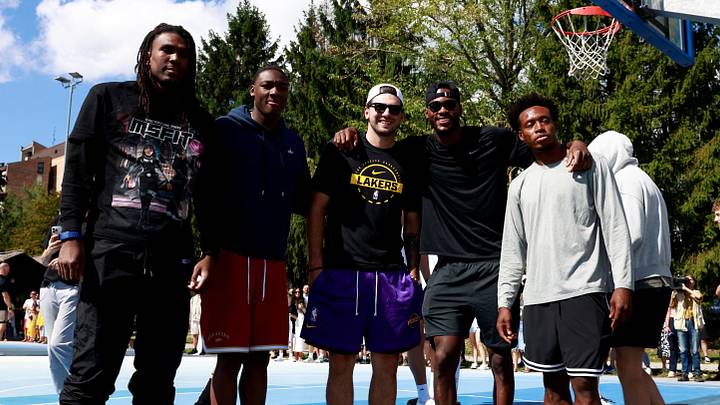 Basketball - NBA - Los Angeles Lakers visit to Ljubljana - Ljubljana, Slovenia - August 23, 2026 Los Angeles Lakers' Luka Doncic poses for a photo with teammates on the court where he played growing up in Ljubljana REUTERS/Borut Zivulovic Basketball - NBA - Los Angeles Lakers visit to Ljubljana - Ljubljana, Slovenia - August 23, 2026 Los Angeles Lakers' Luka Doncic poses for a photo with teammates on the court where he played growing up in Ljubljana REUTERS/Borut Zivulovic