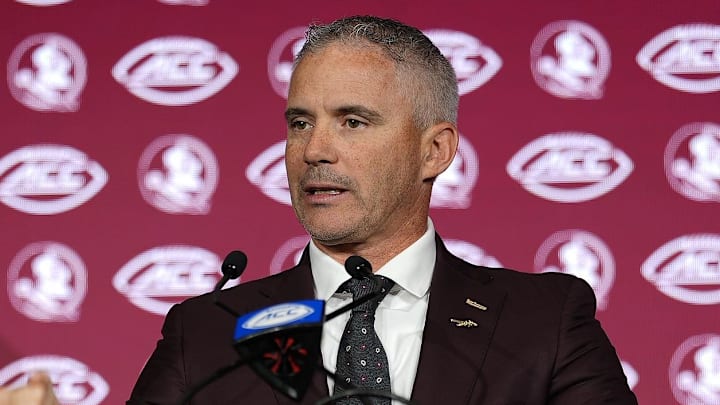 Jul 23, 2025; Charlotte, NC, USA; Florida State head coach Mike Norvell answers questions from the media during ACC Media days at Hilton Charlotte Uptown. Mandatory Credit: Jim Dedmon-Imagn Images