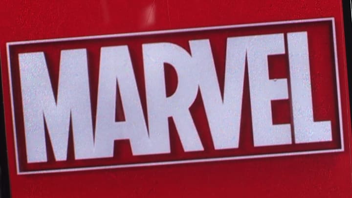 In this photo illustration, Marvel Entertainment logo seen...