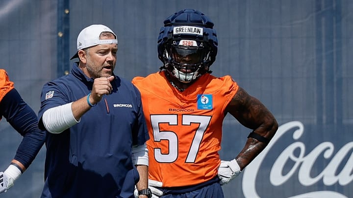 Jul 24, 2025; Englewood, CO, USA; Denver Broncos inside linebackers coach Jeff Schmedding with linebackers Levelle Bailey (56), Justin Strnad (40), Drew Sanders (41), Dre Greenlaw (57), and Alex Singleton (49) during Denver Broncos Training Camp