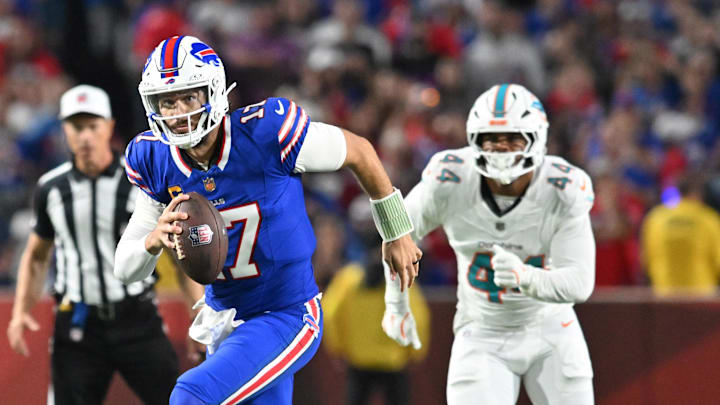 Sep 18, 2025; Orchard Park, New York, USA; Buffalo Bills quarterback Josh Allen (17) runs against the Miami Dolphins in the second half at Highmark Stadium. Mandatory Credit: Mark Konezny-Imagn Images