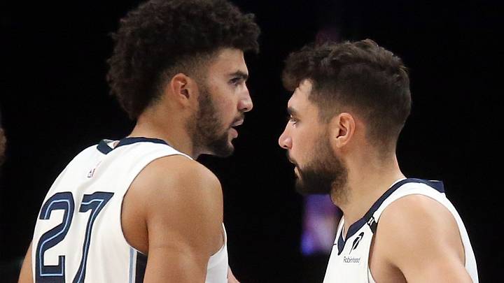 Oct 7, 2026; Memphis, Tennessee, USA; Memphis Grizzlies forward Cameron Boozer (27) and guard Ty Jerome (2) react during the second quarter against the Orlando Magic at FedExForum. Mandatory Credit: Petre Thomas-Imagn Images