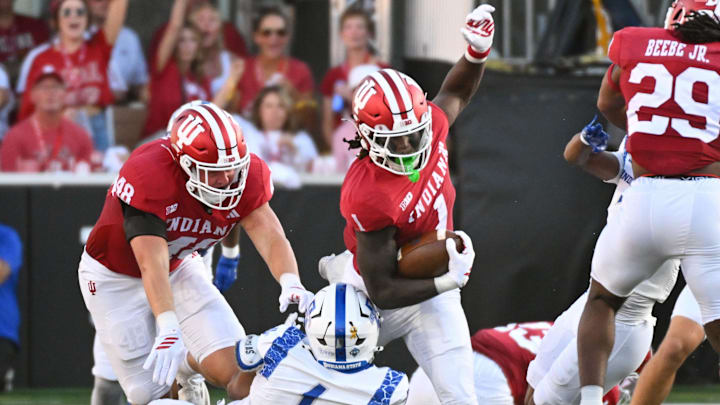 Sep 12, 2025; Bloomington, Indiana, USA; Indiana Hoosiers running back Roman Hemby (1) returns a kickoff during the first half against the Indiana State Sycamores at Memorial Stadium. Mandatory Credit: Robert Goddin-Imagn Images Sep 12, 2025; Bloomington, Indiana, USA; Indiana Hoosiers running back Roman Hemby (1) returns a kickoff during the first half against the Indiana State Sycamores at Memorial Stadium. Mandatory Credit: Robert Goddin-Imagn Images