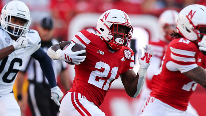Nebraska running back Emmett Johnson scores on a 47-yard run against Akron.