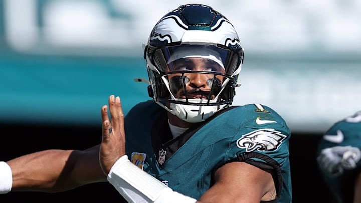 Oct 5, 2025; Philadelphia, Pennsylvania, USA; Philadelphia Eagles quarterback Jalen Hurts (1) passes against the Denver Broncos in the second quarter at Lincoln Financial Field.  