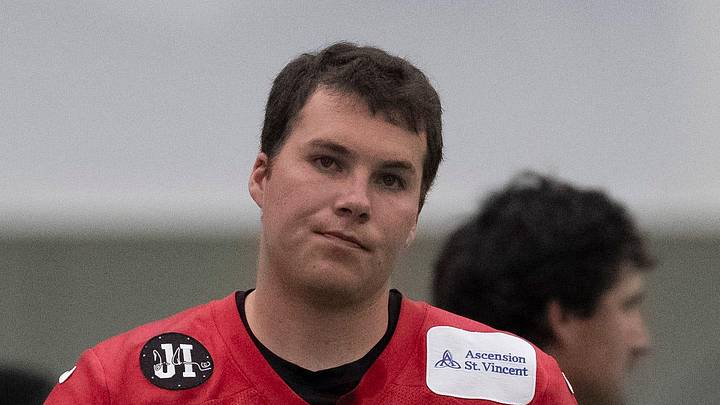 Indianapolis Colts quarterback Riley Leonard walks on the practice field