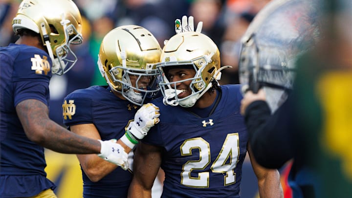 Notre Dame running back Jadarian Price (24) celebrates after scoring a touchdown in the first half of a NCAA football game against Syracuse at Notre Dame Stadium on Saturday, Nov. 22, 2025, in South Bend.
