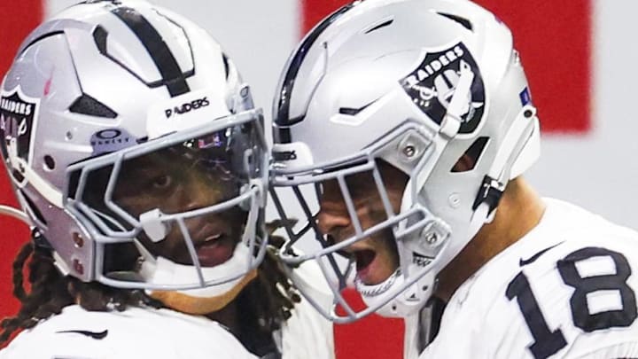 Dec 21, 2025; Houston, Texas, USA; Las Vegas Raiders running back Ashton Jeanty (2) celebrates with wide receiver Jack Bech (18) after catching a touchdown pass against the Houston Texans during the third quarter at NRG Stadium. Mandatory Credit: Thomas Shea-Imagn Images