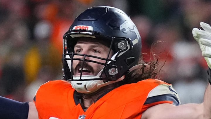 Dec 14, 2025; Denver, Colorado, USA; Denver Broncos linebacker Alex Singleton (49) celebrates defeating the Green Bay Packers during the fourth quarter at Empower Field at Mile High. Mandatory Credit: Ron Chenoy-Imagn Images