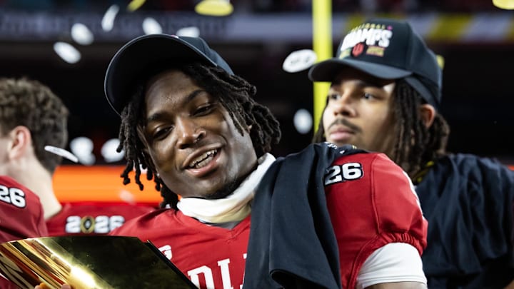 Indiana Hoosiers defensive back D'Angelo Ponds (5) celebrates with the trophy after defeating the Miami Hurricanes 