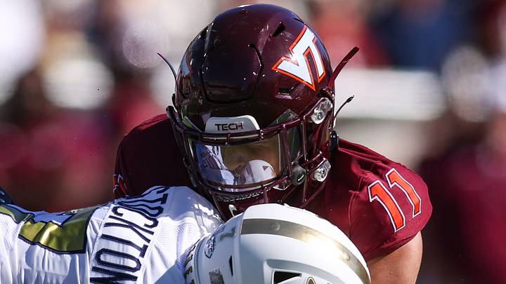 Oct 11, 2025; Atlanta, Ga.; Georgia Tech wide receiver Bailey Stockton (7) is tackled by Virginia Tech safety Tyson Flowers (11).