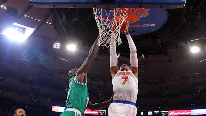 May 1, 2013; New York, NY, USA; New York Knicks forward Carmelo Anthony (7) dunks over Boston Celtics center Kevin Garnett (5) during the first quarter of game five of the first round of the 2013 NBA Playoffs at Madison Square Garden. Mandatory Credit: Brad Penner-Imagn Images May 1, 2013; New York, NY, USA; New York Knicks forward Carmelo Anthony (7) dunks over Boston Celtics center Kevin Garnett (5) during the first quarter of game five of the first round of the 2013 NBA Playoffs at Madison Square Garden. Mandatory Credit: Brad Penner-Imagn Images
