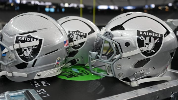 Nov 23, 2025; Paradise, Nevada, USA; Las Vegas Raiders helmets on the sidelines at Allegiant Stadium. Mandatory Credit: Kirby Lee-Imagn Images Nov 23, 2025; Paradise, Nevada, USA; Las Vegas Raiders helmets on the sidelines at Allegiant Stadium. Mandatory Credit: Kirby Lee-Imagn Images