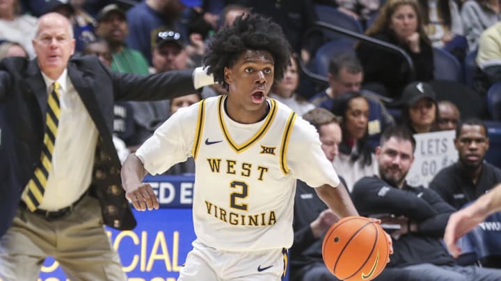 Jan 17, 2026; Morgantown, West Virginia, USA; West Virginia Mountaineers guard Amir Jenkins (2) dribbles during the second half against the Colorado Buffaloes at Hope Coliseum. Mandatory Credit: Ben Queen-Imagn Images