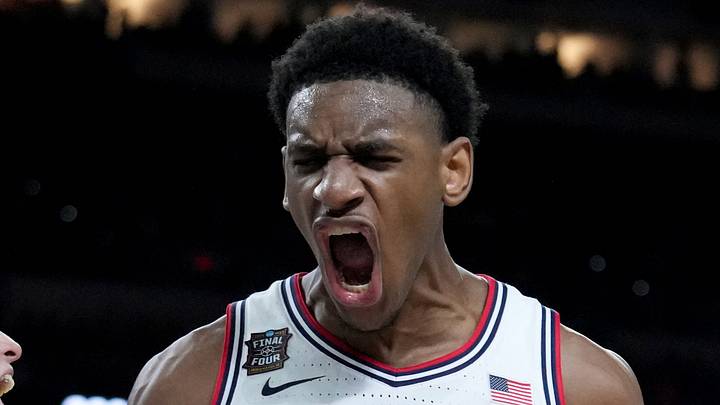 UConn Huskies forward Tarris Reed Jr. (5) celebrates the team's Final Four victory Saturday, April 4, 2026, after defeating the Illinois Fighting Illini 71-62 at Lucas Oil Stadium in Indianapolis.
