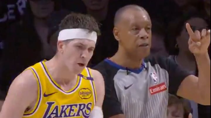 Los Angeles Lakers guard Austin Reaves yells at a referee for a no-call.