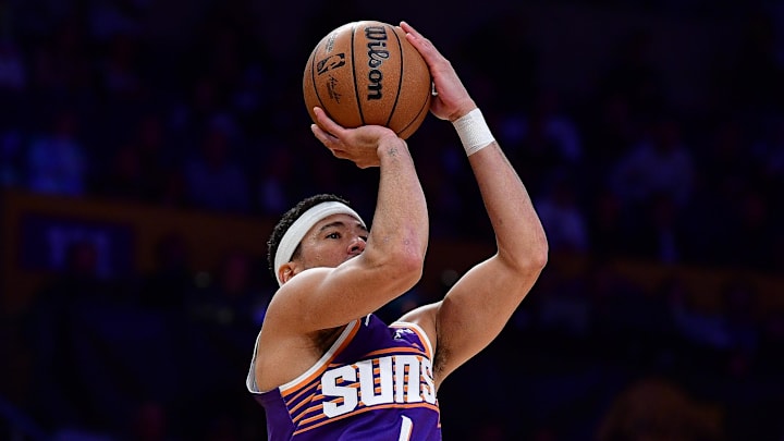 Dec 1, 2025; Los Angeles, California, USA; Phoenix Suns guard Devin Booker (1) shoots against the Los Angeles Lakers during the first half at Crypto.com Arena. Mandatory Credit: Gary A. Vasquez-Imagn Images Dec 1, 2025; Los Angeles, California, USA; Phoenix Suns guard Devin Booker (1) shoots against the Los Angeles Lakers during the first half at Crypto.com Arena. Mandatory Credit: Gary A. Vasquez-Imagn Images