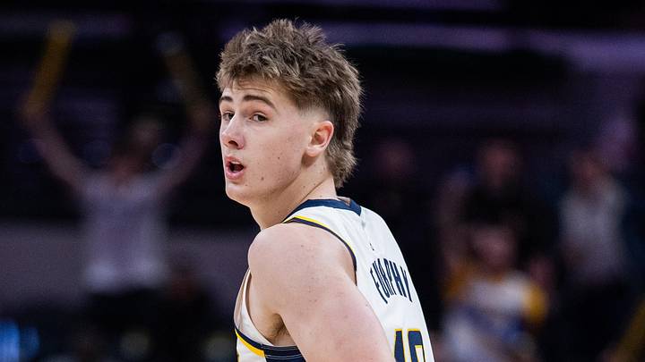 Jan 14, 2026; Indianapolis, Indiana, USA; Indiana Pacers guard Johnny Furphy (12) in the second half against the Toronto Raptors at Gainbridge Fieldhouse. Mandatory Credit: Trevor Ruszkowski-Imagn Images Jan 14, 2026; Indianapolis, Indiana, USA; Indiana Pacers guard Johnny Furphy (12) in the second half against the Toronto Raptors at Gainbridge Fieldhouse. Mandatory Credit: Trevor Ruszkowski-Imagn Images