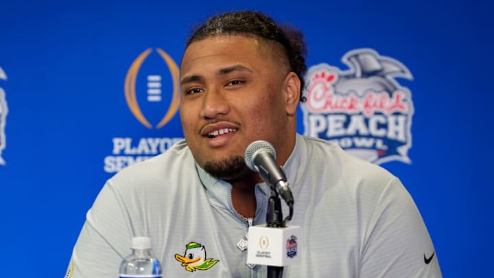 Oregon center Iapani Laloulu speaks during a media day as the Oregon Ducks arrive on Jan. 7, 2025, in Atlanta, Georgia ahead of the Peach Bowl at Mercedes-Benz Stadium.