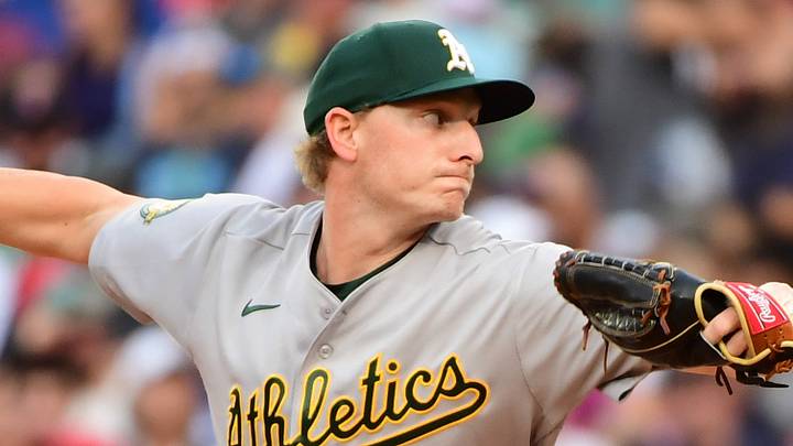 Aug 8, 2026; Boston, Massachusetts, USA;  Athletics pitcher Seth Johnson (52) pitches during the eighth inning against the Boston Red Sox at Fenway Park. Mandatory Credit: Bob DeChiara-Imagn Images