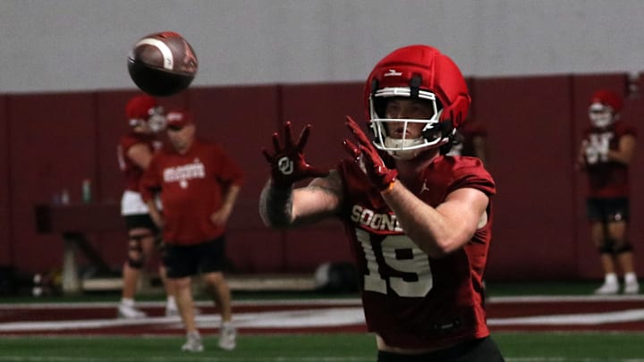 Oklahoma tight end Kade McIntyre catches a pass during a spring practice.