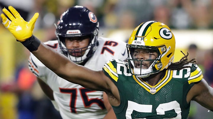Green Bay Packers defender Rashan Gary (52) pressures the passer against the Chicago Bears in 2022. Green Bay Packers defender Rashan Gary (52) pressures the passer against the Chicago Bears in 2022.