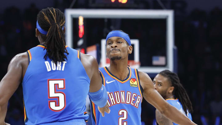 Dec 26, 2023; Oklahoma City, Oklahoma, USA; Oklahoma City Thunder guard Shai Gilgeous-Alexander (2) and guard Luguentz Dort (5) celebrate after scoring against the Minnesota Timberwolves during the second half at Paycom Center. Mandatory Credit: Alonzo Adams-USA TODAY Sports Dec 26, 2023; Oklahoma City, Oklahoma, USA; Oklahoma City Thunder guard Shai Gilgeous-Alexander (2) and guard Luguentz Dort (5) celebrate after scoring against the Minnesota Timberwolves during the second half at Paycom Center. Mandatory Credit: Alonzo Adams-USA TODAY Sports