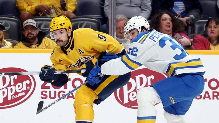 Oct 17, 2026; Nashville, Tennessee, USA; Nashville Predators left wing Filip Forsberg (9) passes past St. Louis Blues center Dylan Peterson (32) during the first period at Bridgestone Arena. Mandatory Credit: Alan Poizner-Imagn Images Oct 17, 2026; Nashville, Tennessee, USA; Nashville Predators left wing Filip Forsberg (9) passes past St. Louis Blues center Dylan Peterson (32) during the first period at Bridgestone Arena. Mandatory Credit: Alan Poizner-Imagn Images