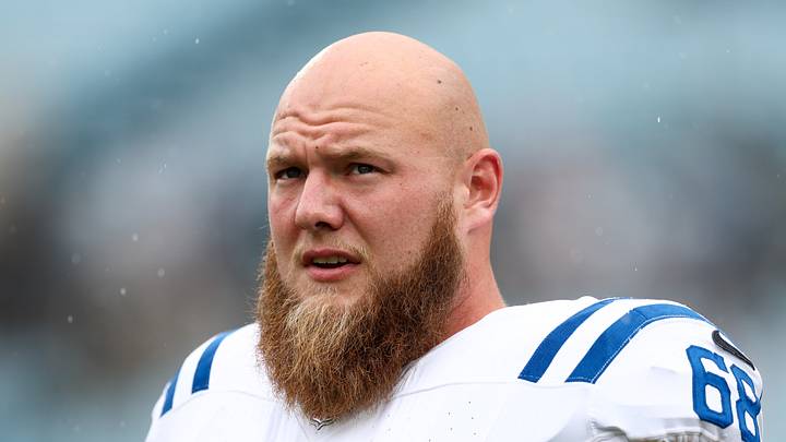 Indianapolis Colts guard Dalton Tucker warms up before a game