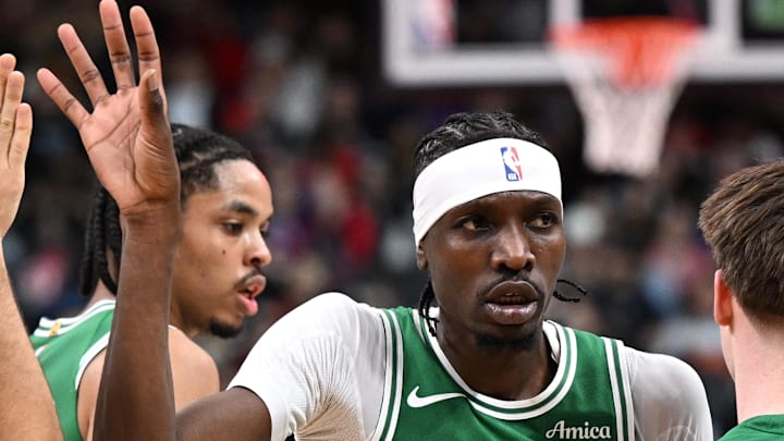Oct 10, 2025; Toronto, Ontario, CAN; Boston Celtics forward Chris Boucher (99) slaps hands with team mates after making a basket against the Toronto Raptors in the first half at Scotiabank Arena. Mandatory Credit: Dan Hamilton-Imagn Images Oct 10, 2025; Toronto, Ontario, CAN; Boston Celtics forward Chris Boucher (99) slaps hands with team mates after making a basket against the Toronto Raptors in the first half at Scotiabank Arena. Mandatory Credit: Dan Hamilton-Imagn Images