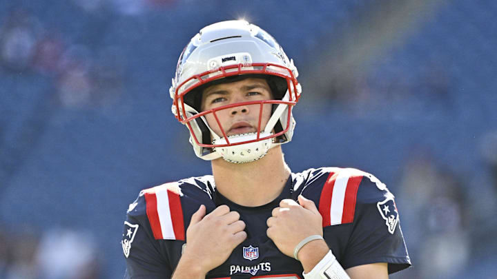 New England Patriots quarterback Drake Maye (10) warms up prior to the game against the Atlanta Falcons