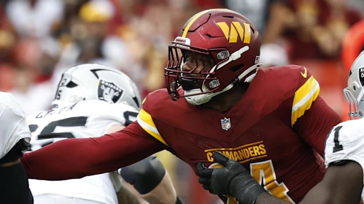 Washington Commanders outside linebacker Von Miller (24) sacks Las Vegas Raiders quarterback Geno Smith (7) during the third quarter  at Northwest Stadium.