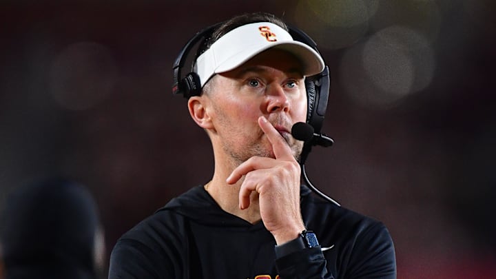 Nov 7, 2025; Los Angeles, California, USA; Southern California Trojans head coach Lincoln Riley watches game action against the Northwestern Wildcats during the second half at the Los Angeles Memorial Coliseum. Mandatory Credit: Gary A. Vasquez-Imagn Images Nov 7, 2025; Los Angeles, California, USA; Southern California Trojans head coach Lincoln Riley watches game action against the Northwestern Wildcats during the second half at the Los Angeles Memorial Coliseum. Mandatory Credit: Gary A. Vasquez-Imagn Images