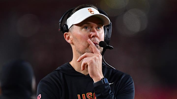 Nov 7, 2025; Los Angeles, California, USA; Southern California Trojans head coach Lincoln Riley watches game action against the Northwestern Wildcats during the second half at the Los Angeles Memorial Coliseum. Mandatory Credit: Gary A. Vasquez-Imagn Images