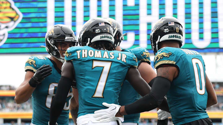 Oct 6, 2024; Jacksonville, Florida, USA; Jacksonville Jaguars wide receiver Brian Thomas Jr. (7) celebrates after scoring a touchdown against the Indianapolis Colts in the second quarter at EverBank Stadium. Mandatory Credit: Nathan Ray Seebeck-Imagn Images