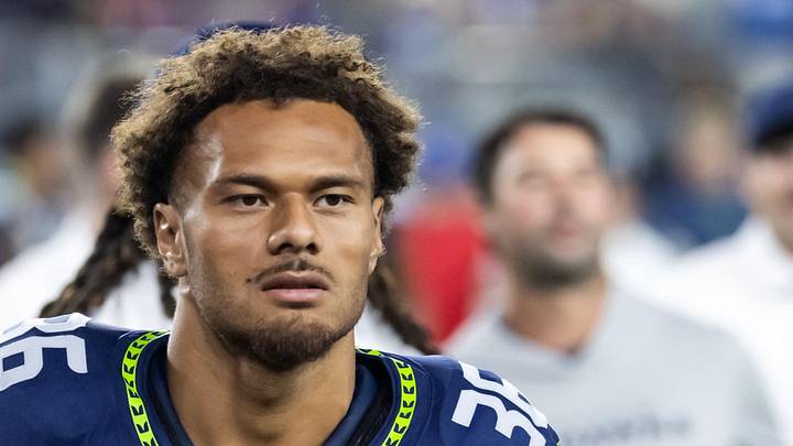 Seattle Seahawks running back George Holani leaves the field