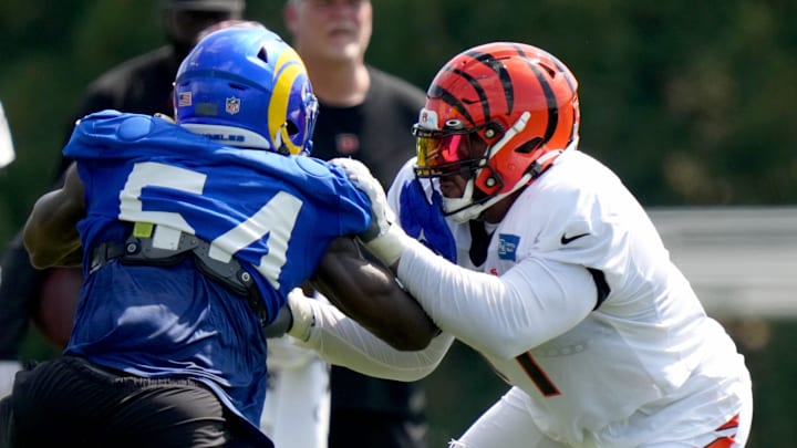 Cincinnati Bengals offensive tackle La'el Collins (71) blocks on Los Angeles Rams linebacker Leonard Floyd (54)during a joint practice, Wednesday, Aug. 24, 2022, at the Paycor Stadium practice fields in Cincinnati.

Los Angeles Rams At Cincinnati Bengals Joint Practice Aug 24 0070