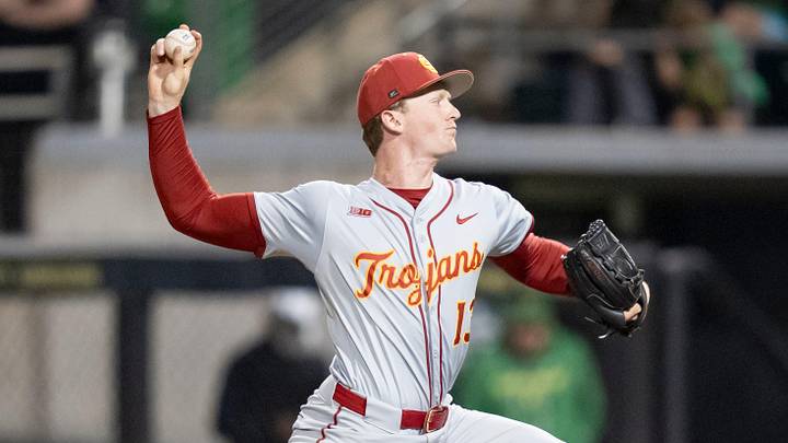 USC pitcher Andrew Johnson throws a pitch as the Oregon Ducks host the USC Trojans on May 14, 2026, in Eugene, Oregon. USC pitcher Andrew Johnson throws a pitch as the Oregon Ducks host the USC Trojans on May 14, 2026, in Eugene, Oregon.
