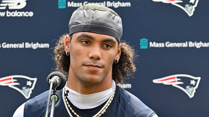 New England Patriots cornerback Christian Gonzalez (0).