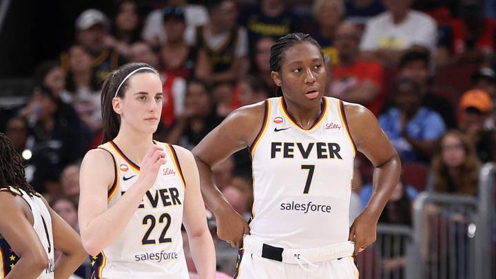 Kelsey Mitchell, Caitlin Clark, and Aliyah Boston during an Indiana Fever game. Kelsey Mitchell, Caitlin Clark, and Aliyah Boston during an Indiana Fever game.