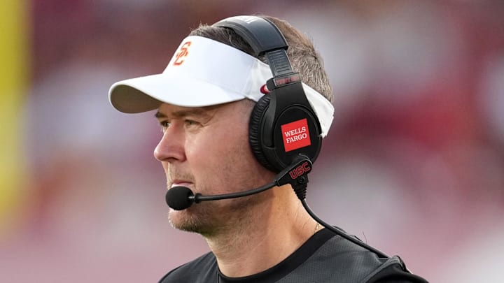 Aug 30, 2025; Los Angeles, California, USA; Southern California Trojans head coach Lincoln Riley watches from the sidelines against the Missouri State Bears in the first half at United Airlines Field at Los Angeles Memorial Coliseum. Mandatory Credit: Kirby Lee-Imagn Images