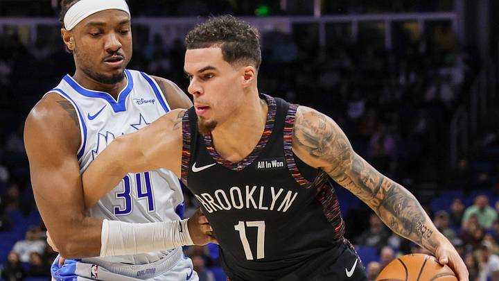 Feb 5, 2026; Orlando, Florida, USA; Brooklyn Nets forward Michael Porter Jr. (17) drives around Orlando Magic center Wendell Carter Jr. (34) during the first quarter at Kia Center. Mandatory Credit: Mike Watters-Imagn Images