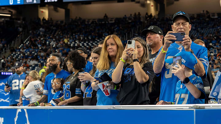 Fan take photos before Detroit Lions pre-season game against the Houston Texans.