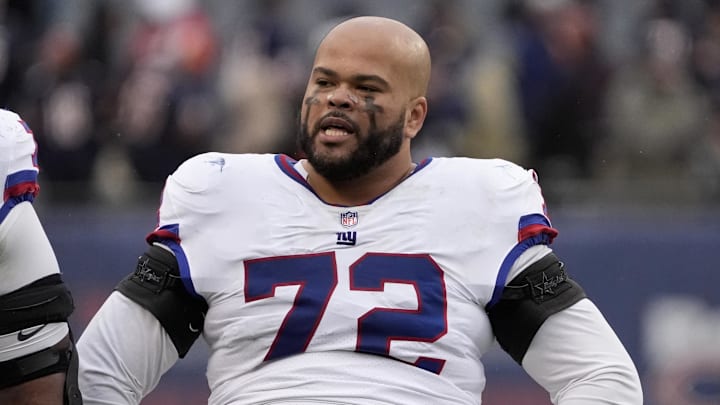 Nov 9, 2025; Chicago, Illinois, USA; New York Giants offensive tackle Jermaine Eluemunor (72) leaves the field after losing to the Chicago Bears at Soldier Field. Mandatory Credit: David Banks-Imagn Images
