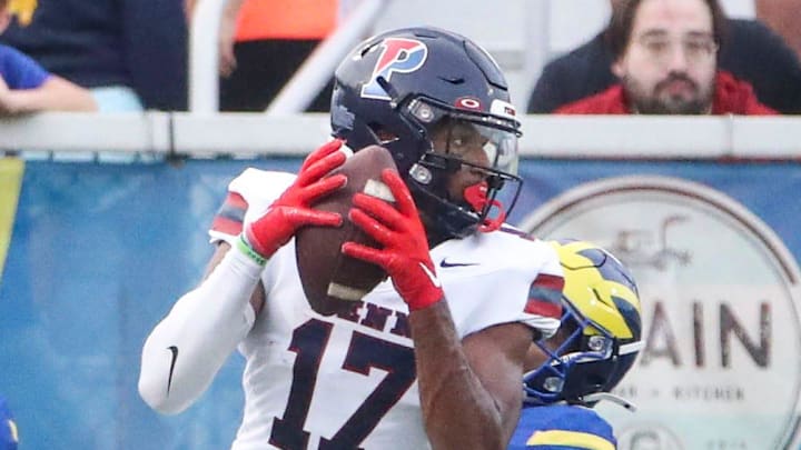 Penn's Jared Richardson gets the Quakers on the board with a 18-yard touchdown reception in the first quarter at Delaware Stadium, Saturday, Sept. 21, 2024.