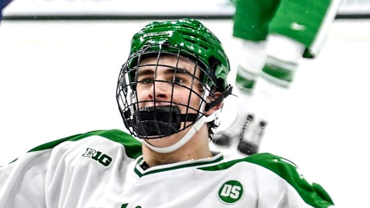 Michigan State's Porter Martone celebrates his empty net goal against Notre Dame during the third period on Thursday, Feb. 19, 2026, at the Munn Ice Arena in East Lansing.