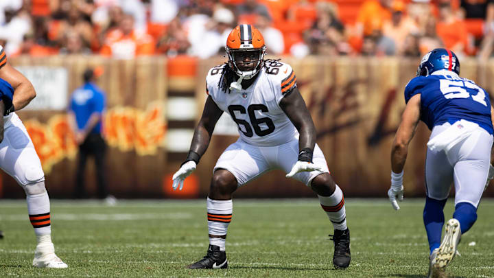 Aug 22, 2021; Cleveland, Ohio, USA; Cleveland Browns offensive tackle James Hudson (66) blocks against the New York Giants during the second quarter at FirstEnergy Stadium. Aug 22, 2021; Cleveland, Ohio, USA; Cleveland Browns offensive tackle James Hudson (66) blocks against the New York Giants during the second quarter at FirstEnergy Stadium.
